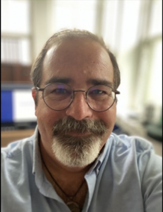 Image of the headshot of author Christopher Deery